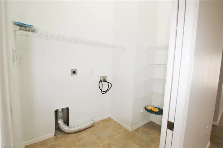 Laundry room with electric dryer hookup and washer hookup