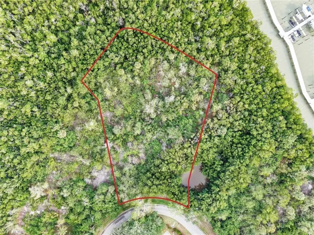 Aerial view of property's location with property parcel outlined