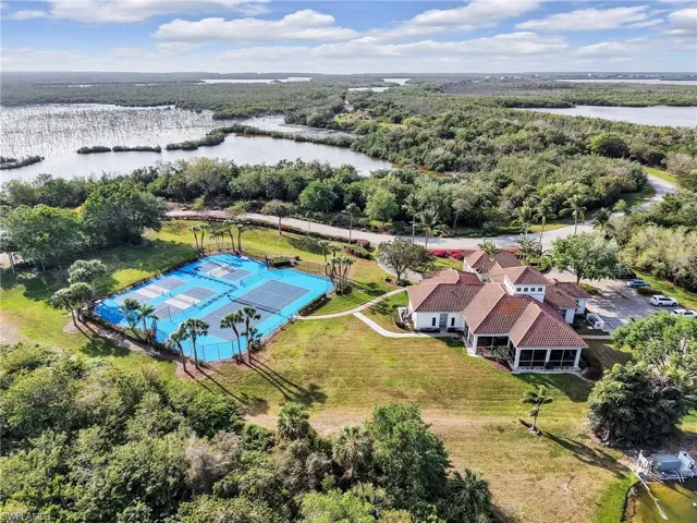 Bird's eye view of a nearby body of water and a forest
