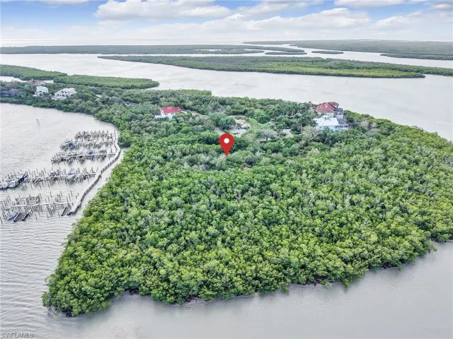 Bird's eye view of a nearby body of water and a marina