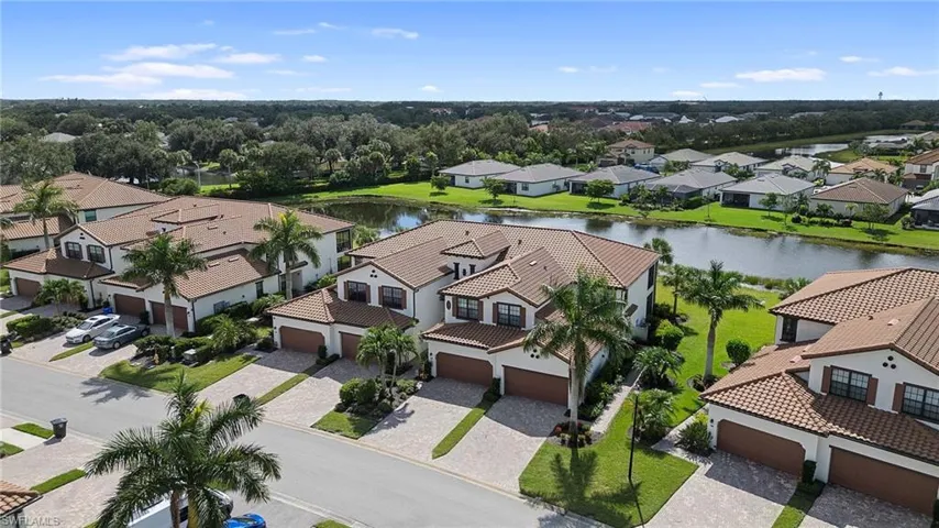 Aerial perspective showcasing a residential community with Mediterranean-style architecture