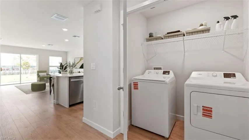 Dedicated laundry closet with wire shelving