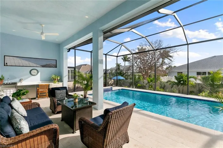 Pool and seating area on lanai