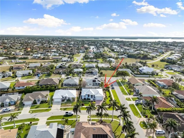 Drone / aerial view of property in neighborhood