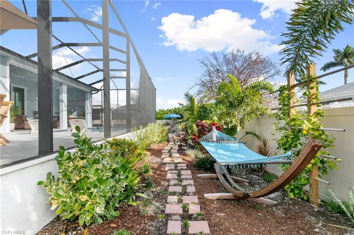hammock and lush lanscaping in backyard