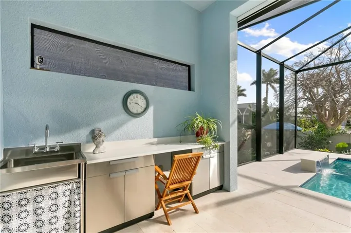 built in sink, counter, storage on lanai
