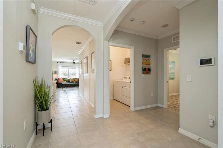 Light bright foyer with tile floors
