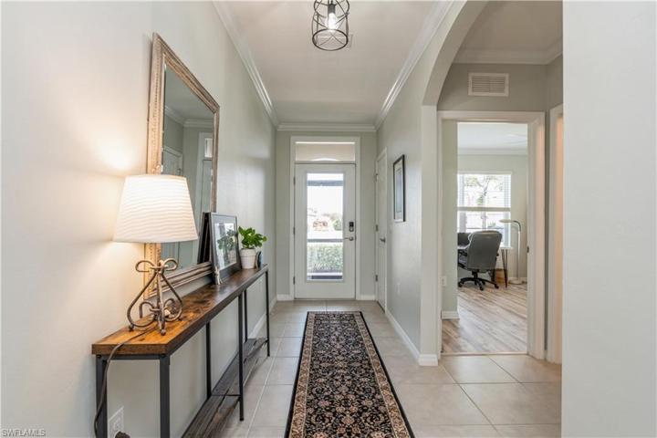 Foyer with beautiful  glass entry door