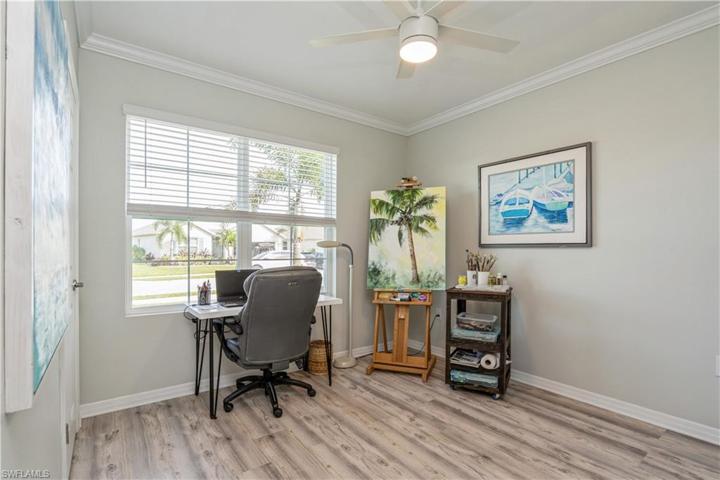 Den/bedroom with luxury vinyl flooring