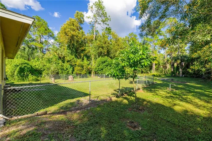 View of yard featuring view of scattered trees