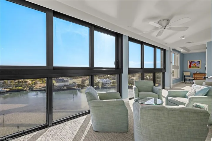 Sunroom / solarium featuring carpet floors