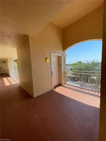 Entrance to property featuring a balcony