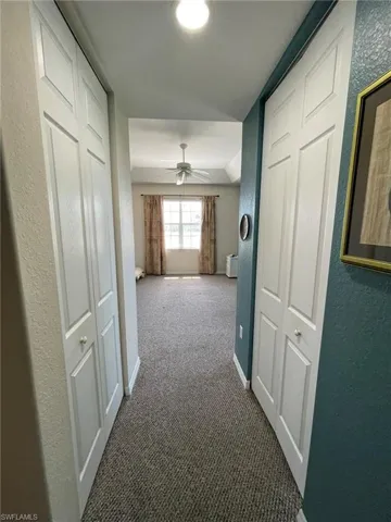 Corridor to Master Bedroom with carpet