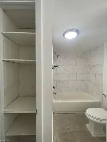 The laundry room has also a bathroom