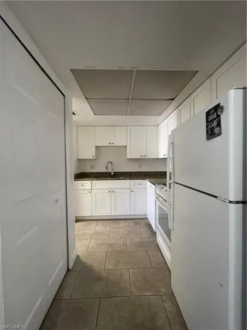 The kitchen has a pantry