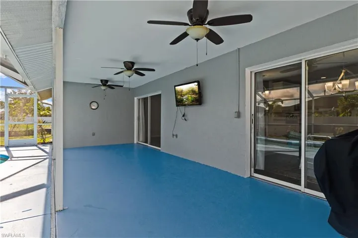 View of patio featuring ceiling fan