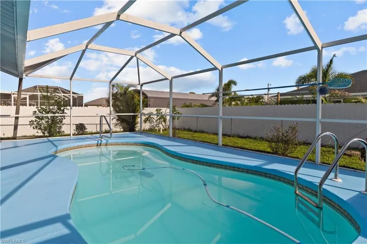 View of pool featuring a lanai
