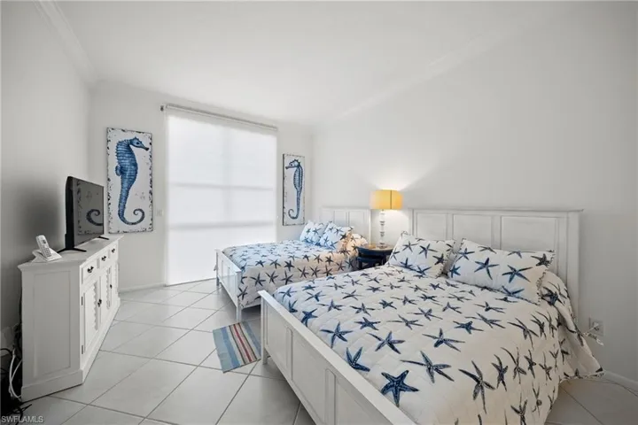 Guest bedroom with two full beds