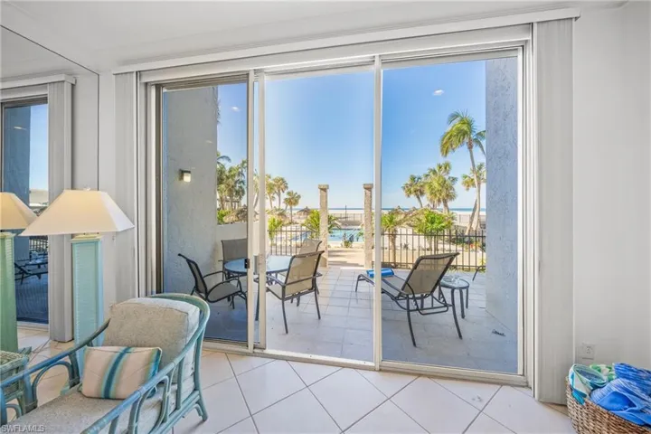 Entryway from pool area, so one has a beachside entrance and two additional entrances to the lobby dedicated to the two beachfront residences #101 and #102