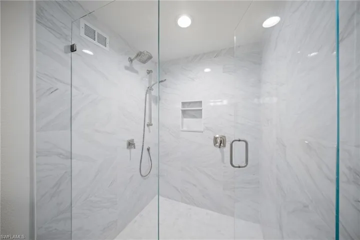New guest room spacious shower.