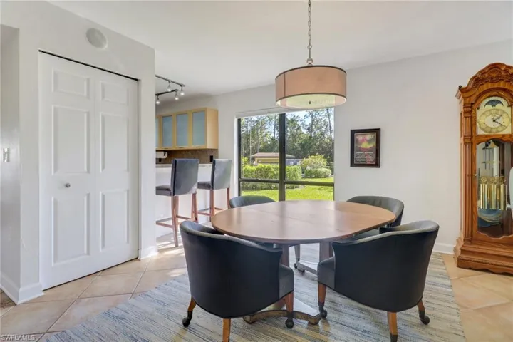 Tiled dining room offers plenty of natural light