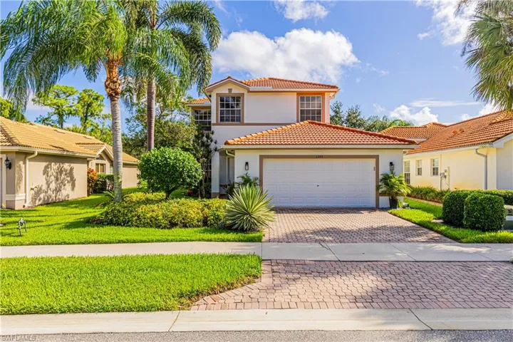 Mediterranean / spanish house featuring a front lawn