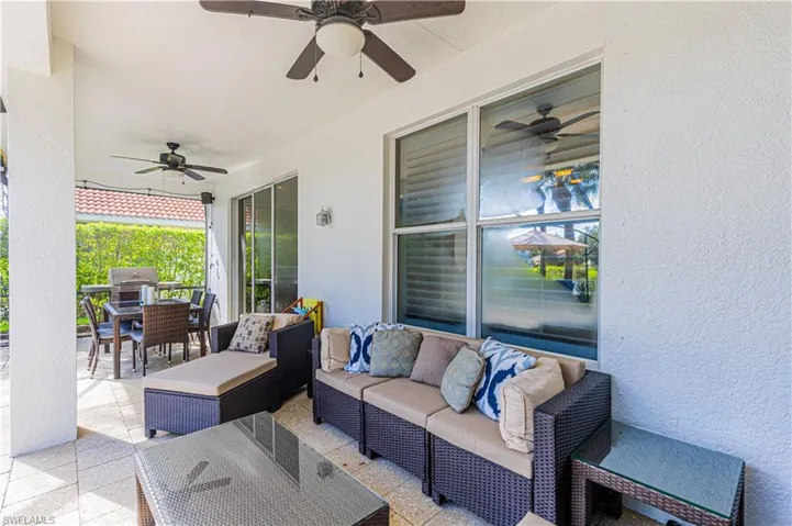 View of patio / terrace with a grill, ceiling fan, and outdoor lounge area