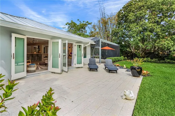 View of patio / terrace with a lanai