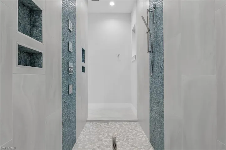 Walkthrough Shower with Grohe System, mixed valves, push button control & rain shower.