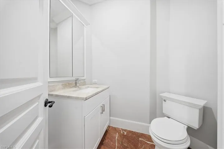 Bathroom featuring toilet and vanity