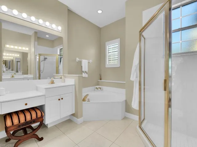 Vanity, soaking tub with natural light
