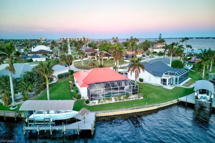 Aerial view at dusk with a water view