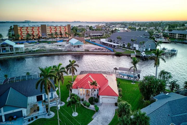 Aerial view at dusk with a water view