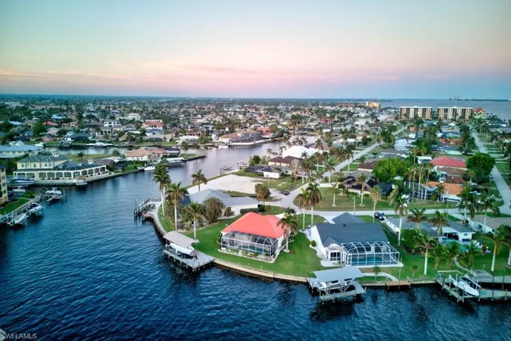 Aerial view at dusk with a water view