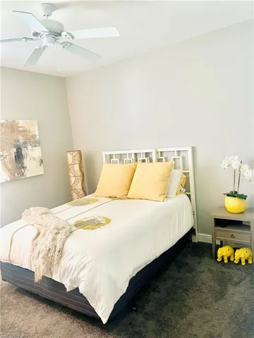 Bedroom featuring carpet floors and ceiling fan