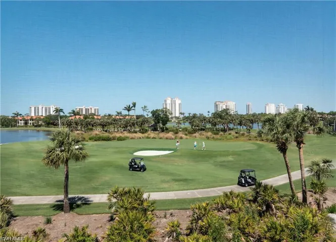 View of home's community featuring view of golf course and a water view