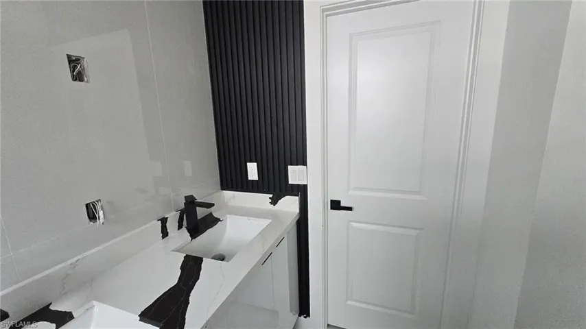 Laundry room featuring a sink
