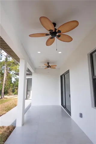 View of patio featuring a ceiling fan