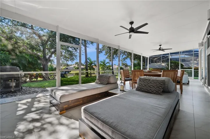 Sunroom with ceiling fan and plenty of natural light
