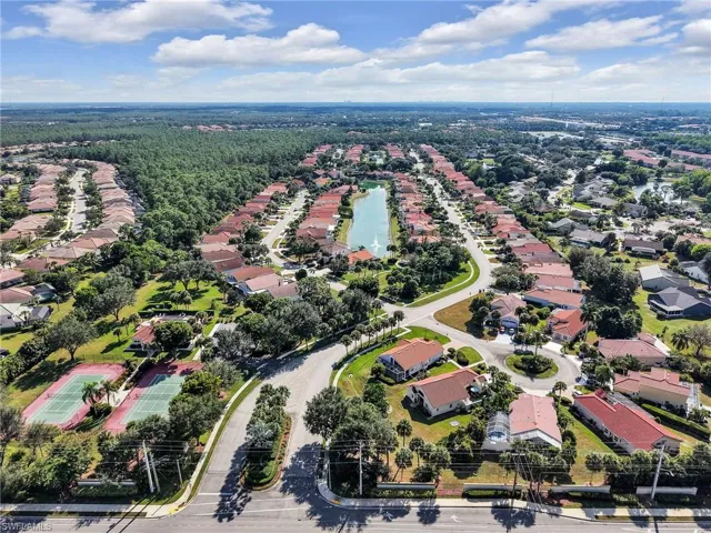 Aerial view of entrance to subdivision.  View of lake.