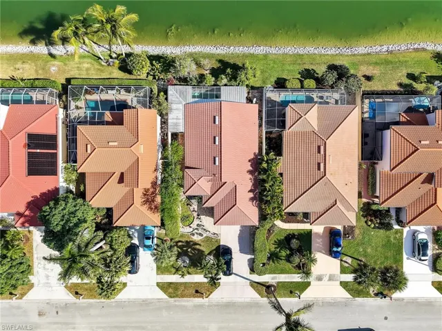 Aerial view of adjacent homes.
