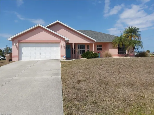 Ranch-style house with an attached garage, concrete driveway, stucco siding, a front lawn, and roof with shingles