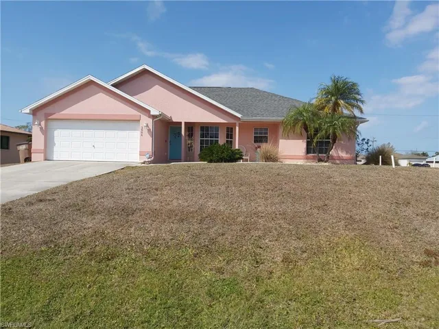 Ranch-style house with stucco siding, an attached garage, concrete driveway, a front lawn, and shingle roof with shingles