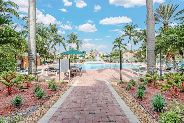 Community pool featuring a patio area