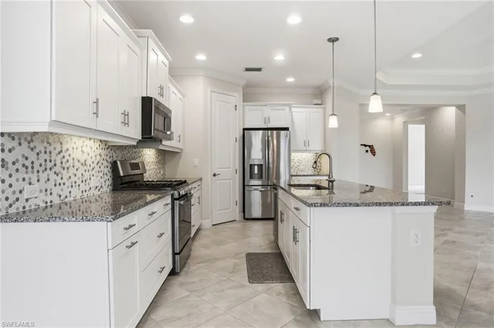 Kitchen area with large island- Virtually enhanced