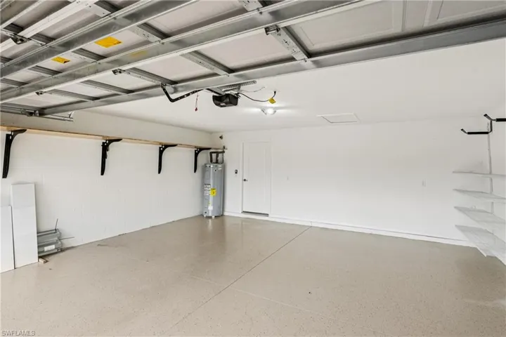 Garage featuring water heater