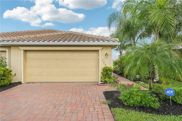 Garage with decorative driveway