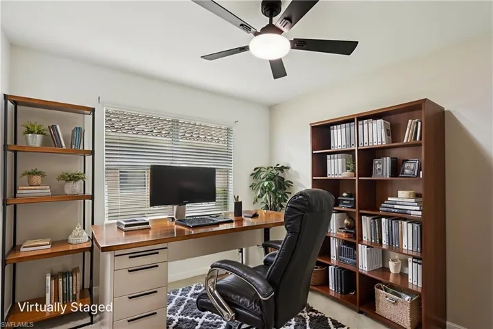 Office area with a ceiling fan