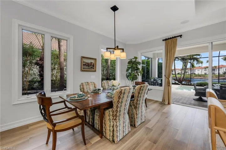 There is a dining room right off of the kitchen, steps away from the lanai.