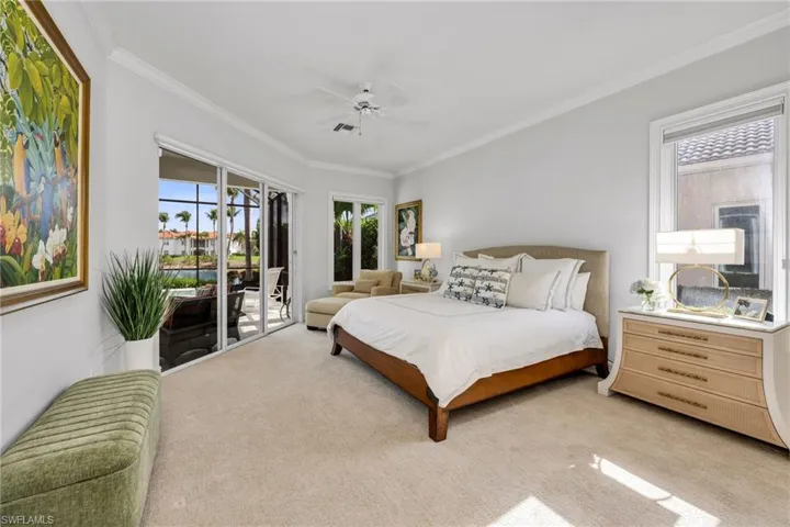 The Primary Suite has sliding glass doors and incredible views to your outside paradise.